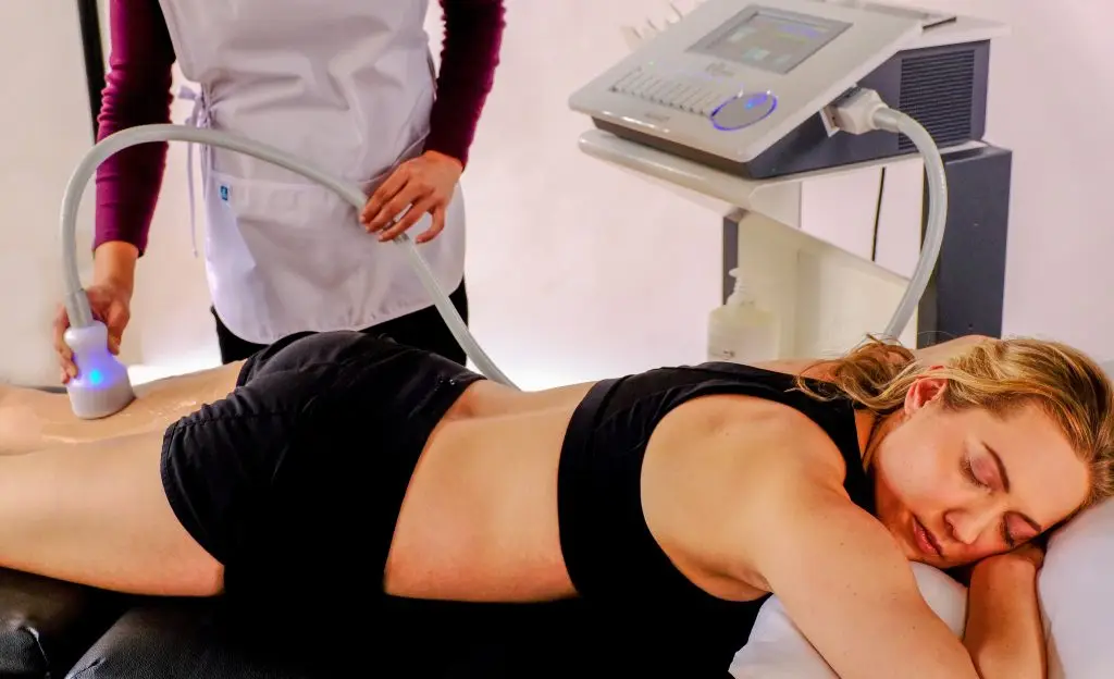 Cryo T-Shock Treatment being done on back of leg.