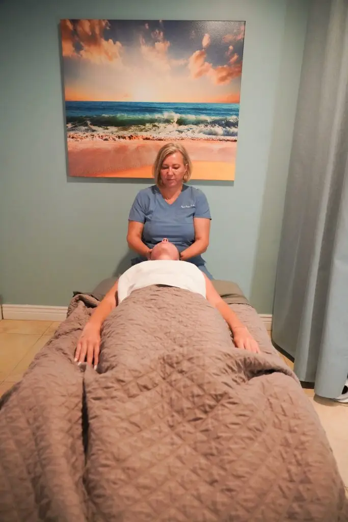 Demonstration of where a buccal massage is performed for facial rejuvenation