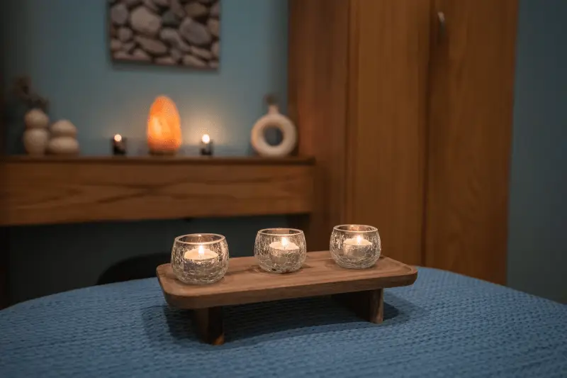 Health massage room set up for immune-boosting treatment with essential oils and warm therapy.
