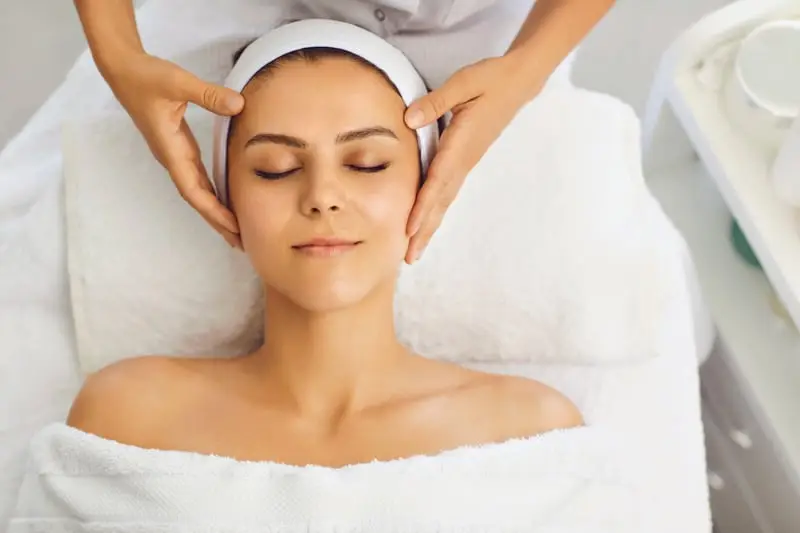 Woman relaxed while receiving a luxury spa treatment