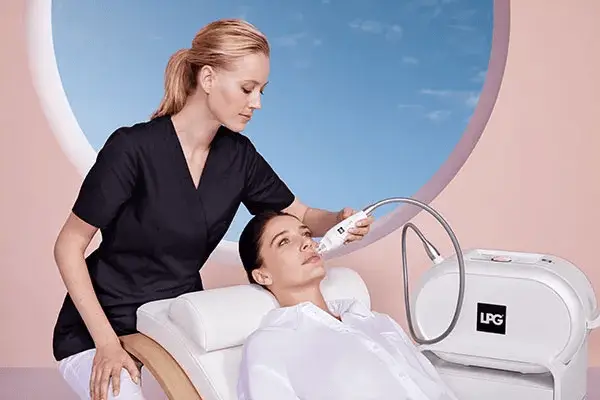 Spa specialist treating client using Endermologie techniques.